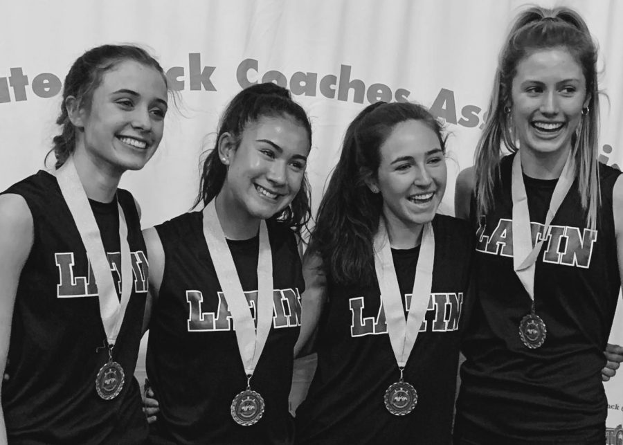 The 4 by 800 relay - From left to right, Abdow, Kim, Everett, Jackson - finished second place at DCLs.