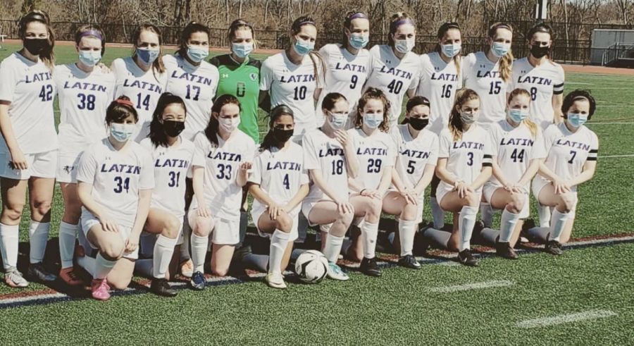 BLS girls soccer pose after their 8-0 win against the OBryant on March 27.
