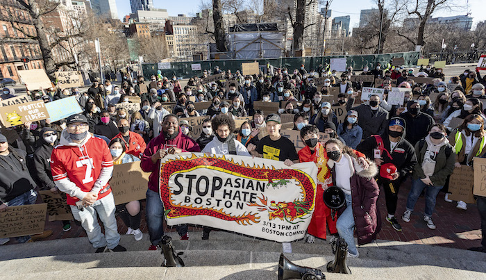 March 13, 2021, Boston Common, Boston, Massachusetts, USA: Protesters rally to protest discrimination and crimes against Asian and Pacific islanders during Stop Asian Hate rally in front of Massachusetts Statehouse in Boston.