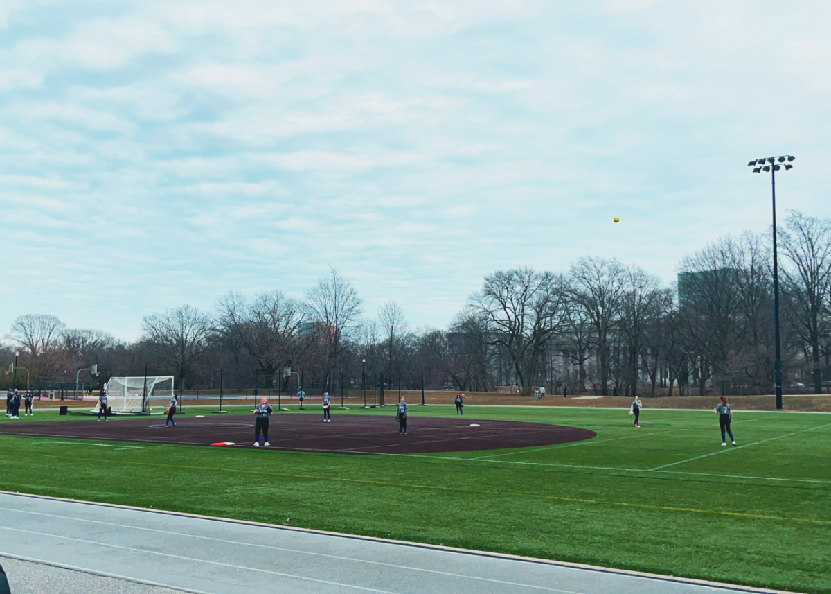 The softball team practices catching before their game. (Source: Isabella Endozo (IV))