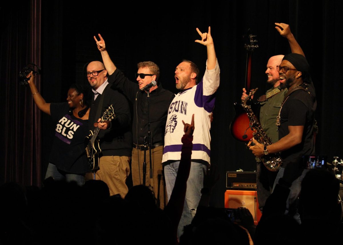 The faculty rock band celebrates their amazing performance! (Source: Lauren Dong (IV))