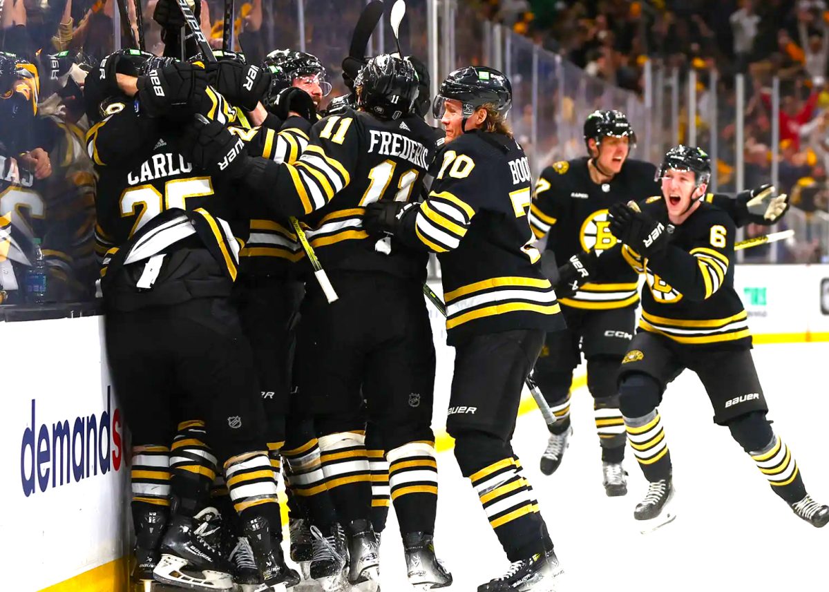 The Bruins are seen celebrating a successful win on the ice. (Source: Maddie Meyer)