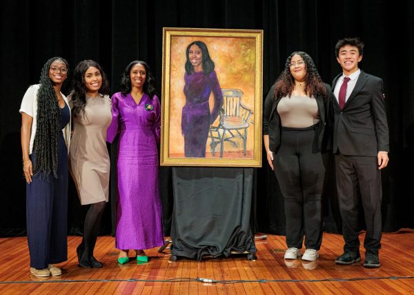 Former Head of School Ms. Rachel Skerritt stands with the class of 2025 officers for her historic portrait unveiling. (Source: Boston Latin School Association)