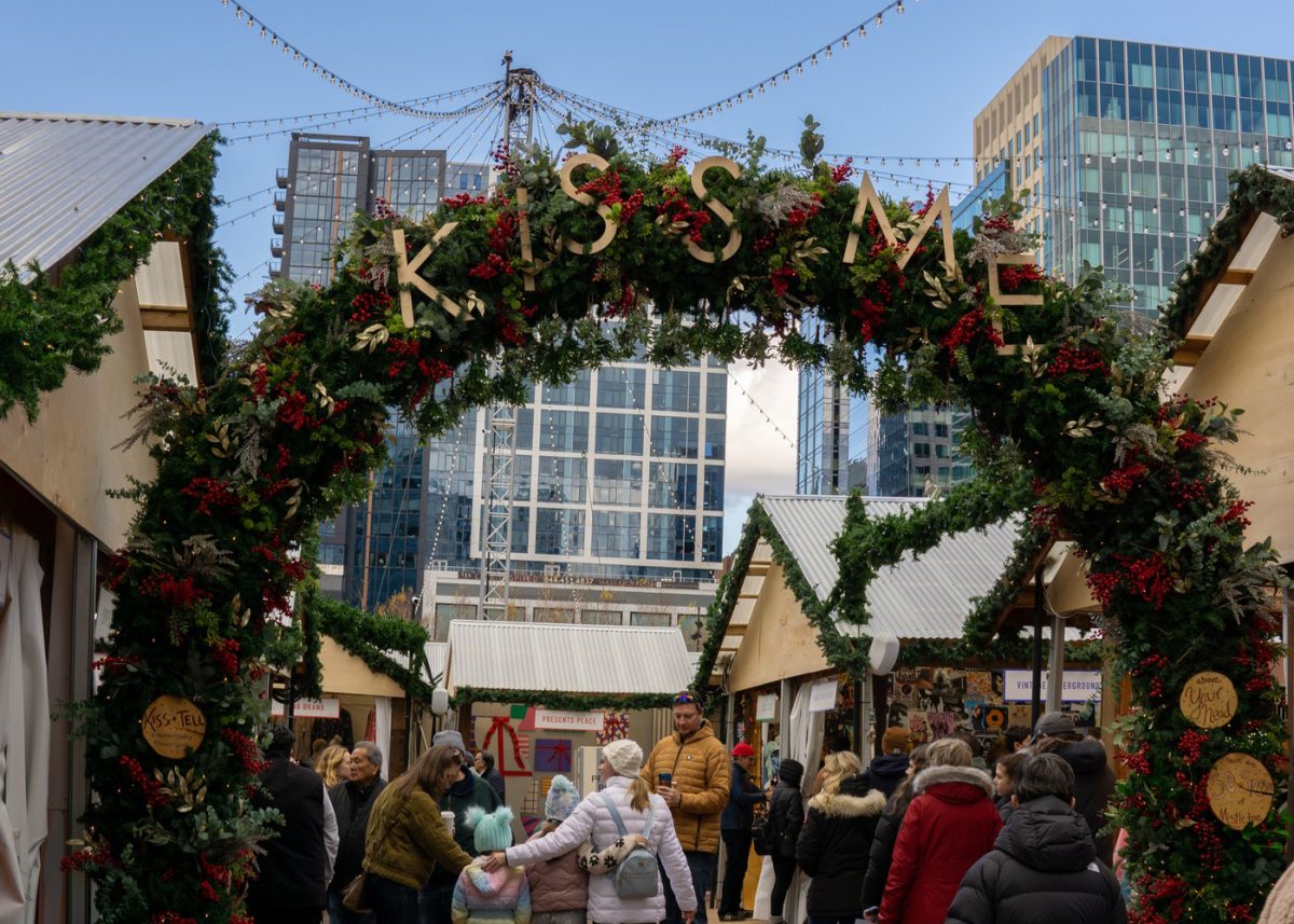 Visitors walk through the wintery Snowport wonderland in Seaport. (Source: Stella A. Gilbert)