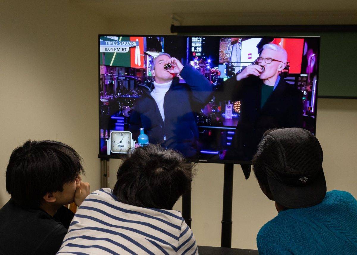 Students watch as TV broadcasters take shots of tequila on air. (Source: Alex Le (II))