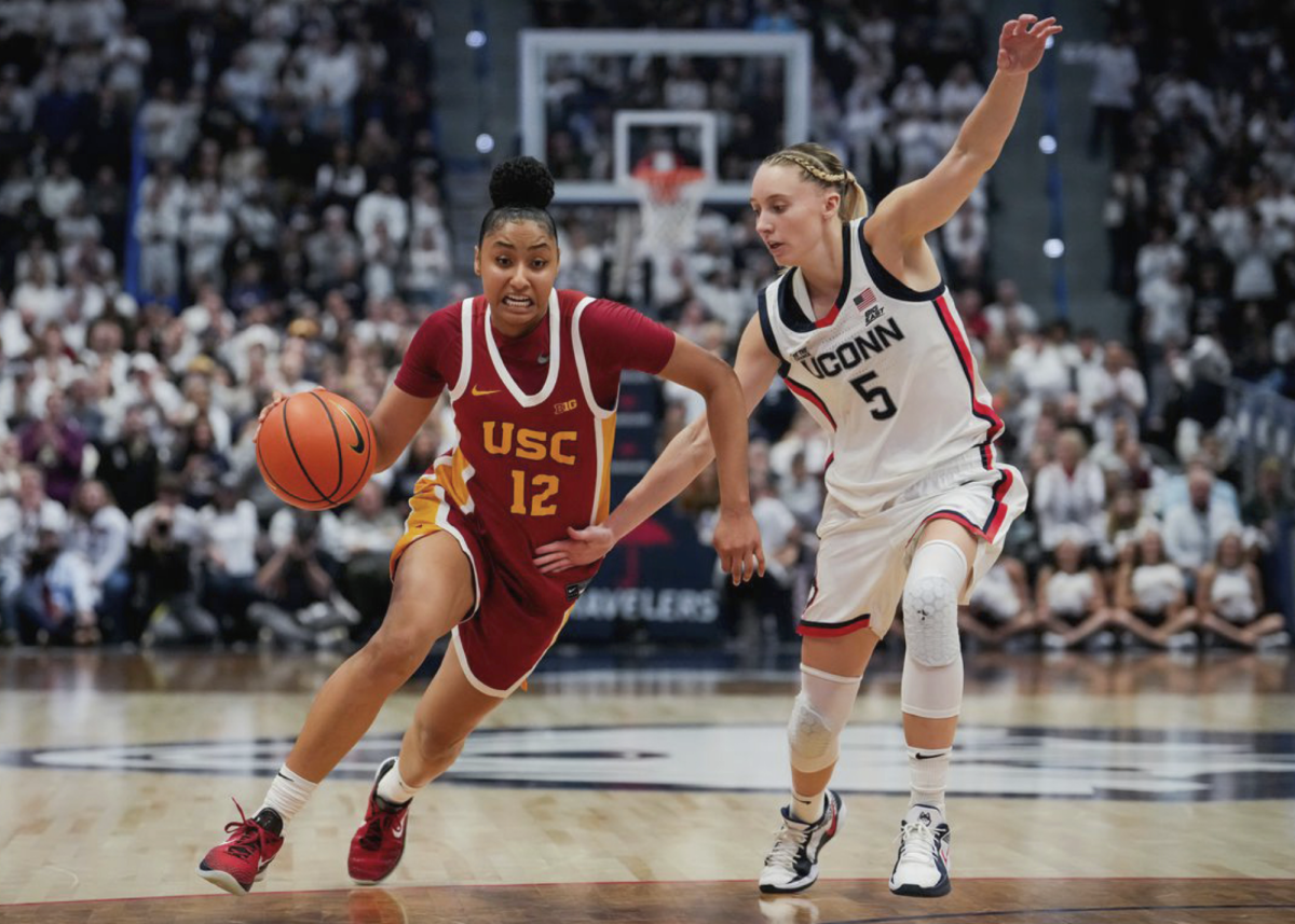 Juju Watkins (left) and Paige Bueckers (right) compete in the March Madness women’s basketball games. (Source: Getty Images)