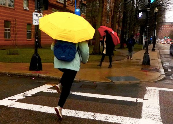 BLS student shows appreciation for the rain, skipping on the way to Ruggles! (Source: Isabella Endozo (III))