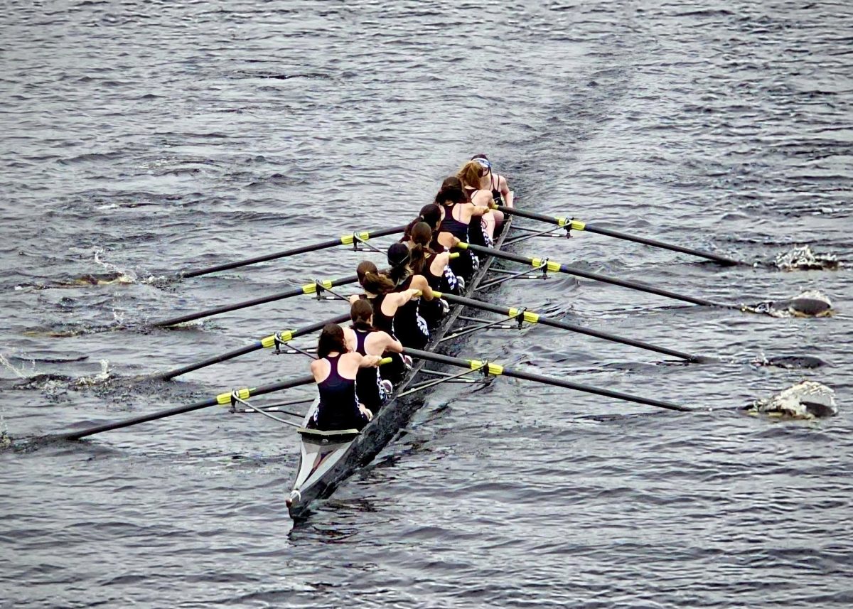 BLS girls’ crew team rows down the Charles River after a race. (Source: Julianne Jang (IV))