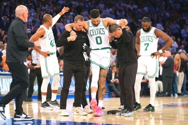 Jayson Tatum gets carried off after rupturing his Achilles’ heel. (Source: NBC News)