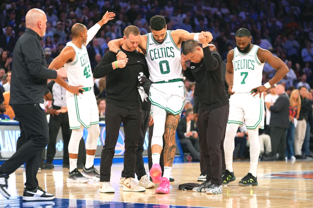 Jayson Tatum gets carried off after rupturing his Achilles’ heel. (Source: NBC News)