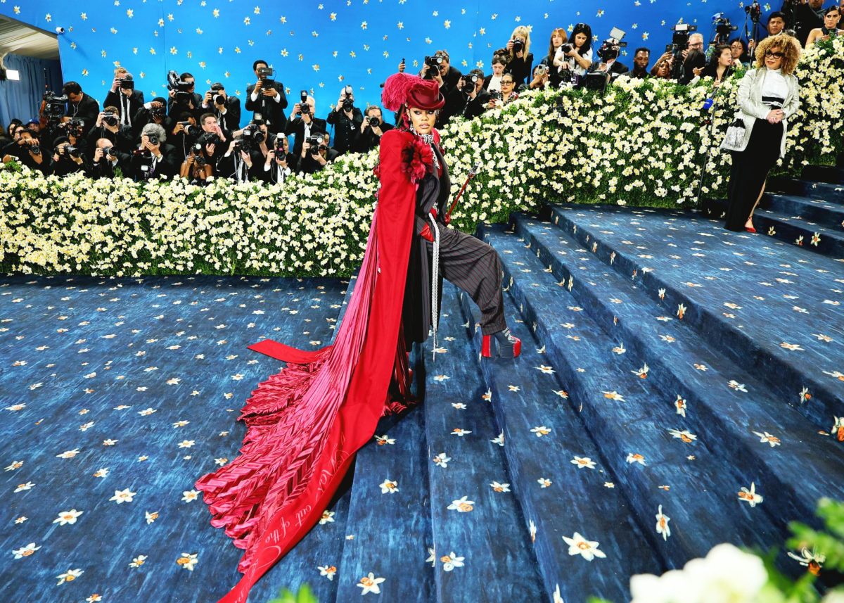 Teyana Taylor is spotted at the Met Gala wearing a red maximalist outfit. (Source: Theo Wargo)