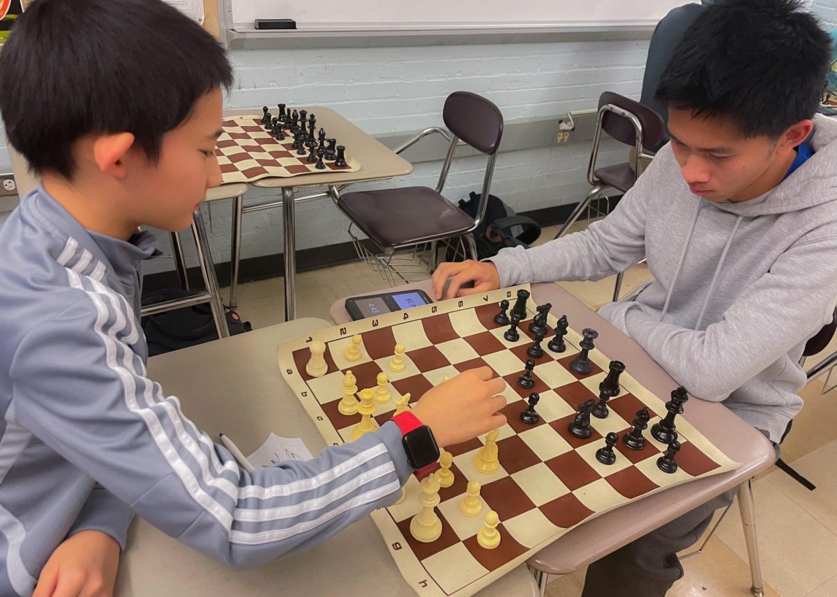 Two BLS students face each other in the chess tournament. (Source: Olivia Chen (II))