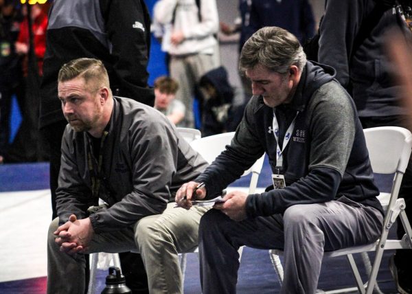 BLS English teacher Mr. Jeffrey Gibbons coaches the wrestling team during the winter season. (Source: Maggie Greene Barrios)